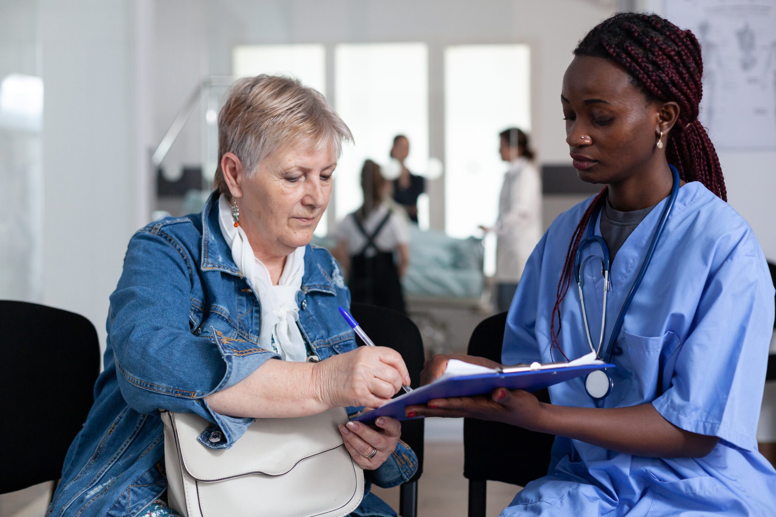 African,American,Female,Geriatrician,Discharging,Elderly,Patient,From,Clinic.,Senior