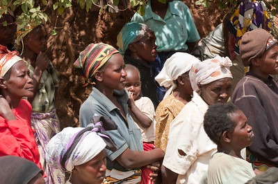 Cash and voucher assistance people lining up to receive cash and voucher assistance after a humanitarian emergency